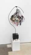 Untitled, 2022, metal, yarn, plaster, mylar, sponge, acrylic polymer, lotus root, wire, and string