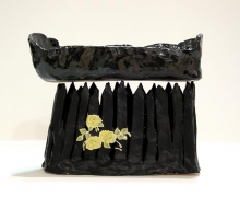 French Bread Pizza Coffin on a Fence, 2005, glazed ceramic with collage&nbsp;